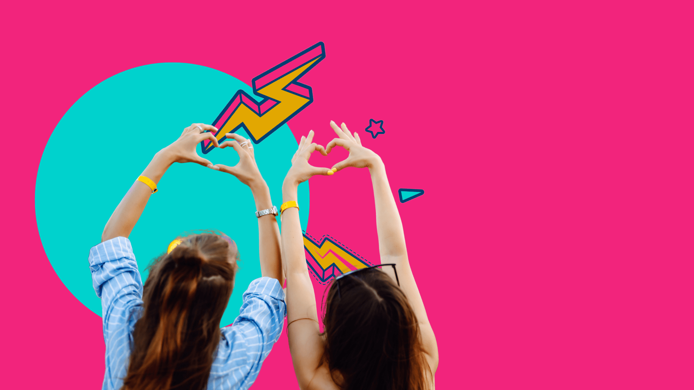 two girls making heart signs with their fingers facing away