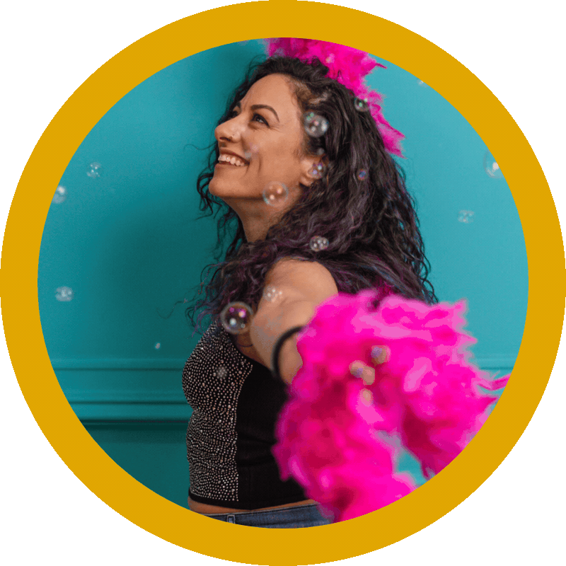 gif of rachel with boa and bubbles